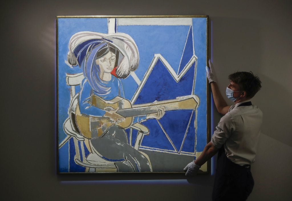 Francoise Gilot, <em>Paloma à la Guitare' set an auction record for the artist with a £922,500 ($1.3 million) sale at Sotheby's London in 2021. Photo by John Phillips/Getty Images for Sotheby's.
