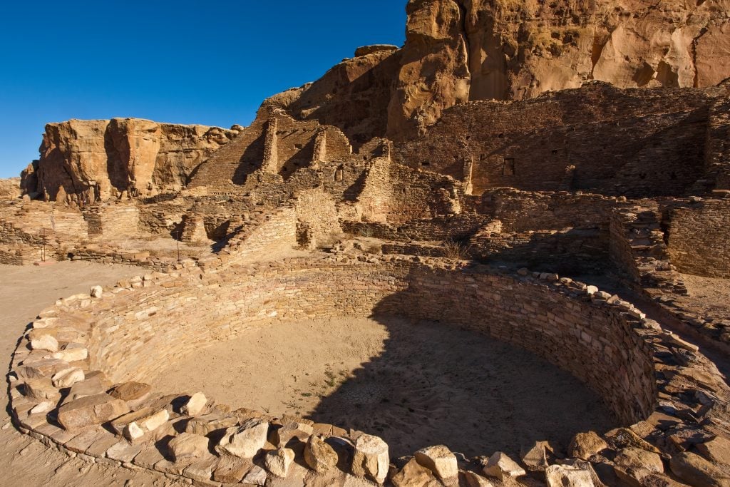 Pueblo Bonito, the ruin of an ancient Ancestral Puebloan Native American Great House in Chaco Culture National Historical Park. Chaco Culture is a UNESCO World Heritage Site. Photo by Jon G. Fuller/VWPics/Universal Images Group via Getty Images.