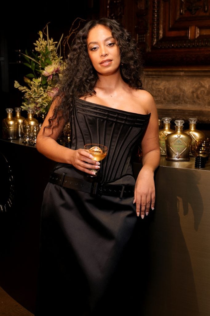 Solange Knowles posing at a launch party for Saint Heron's glassware collection