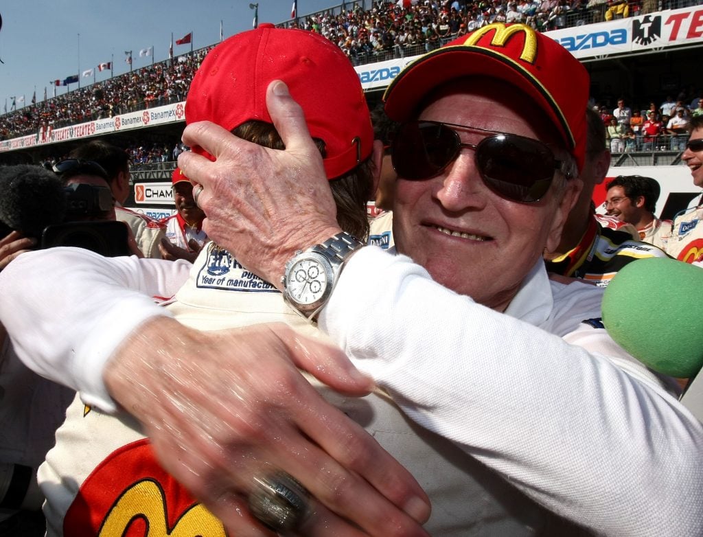 MEXICO CITY - NOVEMBER 11:  Paul Newman congratulating driver Sebastien Bourdais of the  #1 McDonald's Newman Haas Lanigan Racing Panoz DP-01   after winning the Champ Car World Series Grand Premio Tecate on November 11, 2007 at Autodromo Hermonos Rodriguez in Mexico City, Mexico.  (Photo by Jonathan Ferrey/Getty Images)