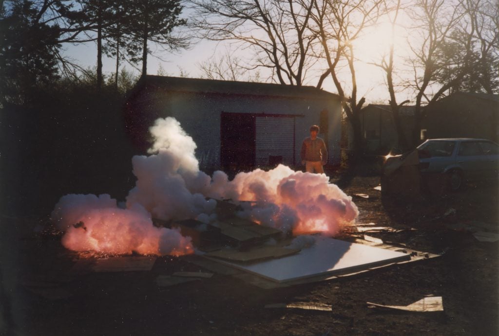Cai Guo-Qiang during the creation of Fetus Movement II: Project for Extraterrestrials No. 9, 1991 Photo courtesy Cai Studio