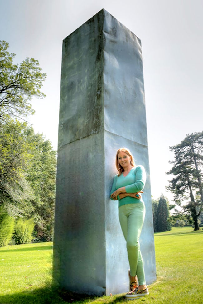 Suzanne Syz next to her Franz West sculpture. Courtesy of Suzanne Syz.
