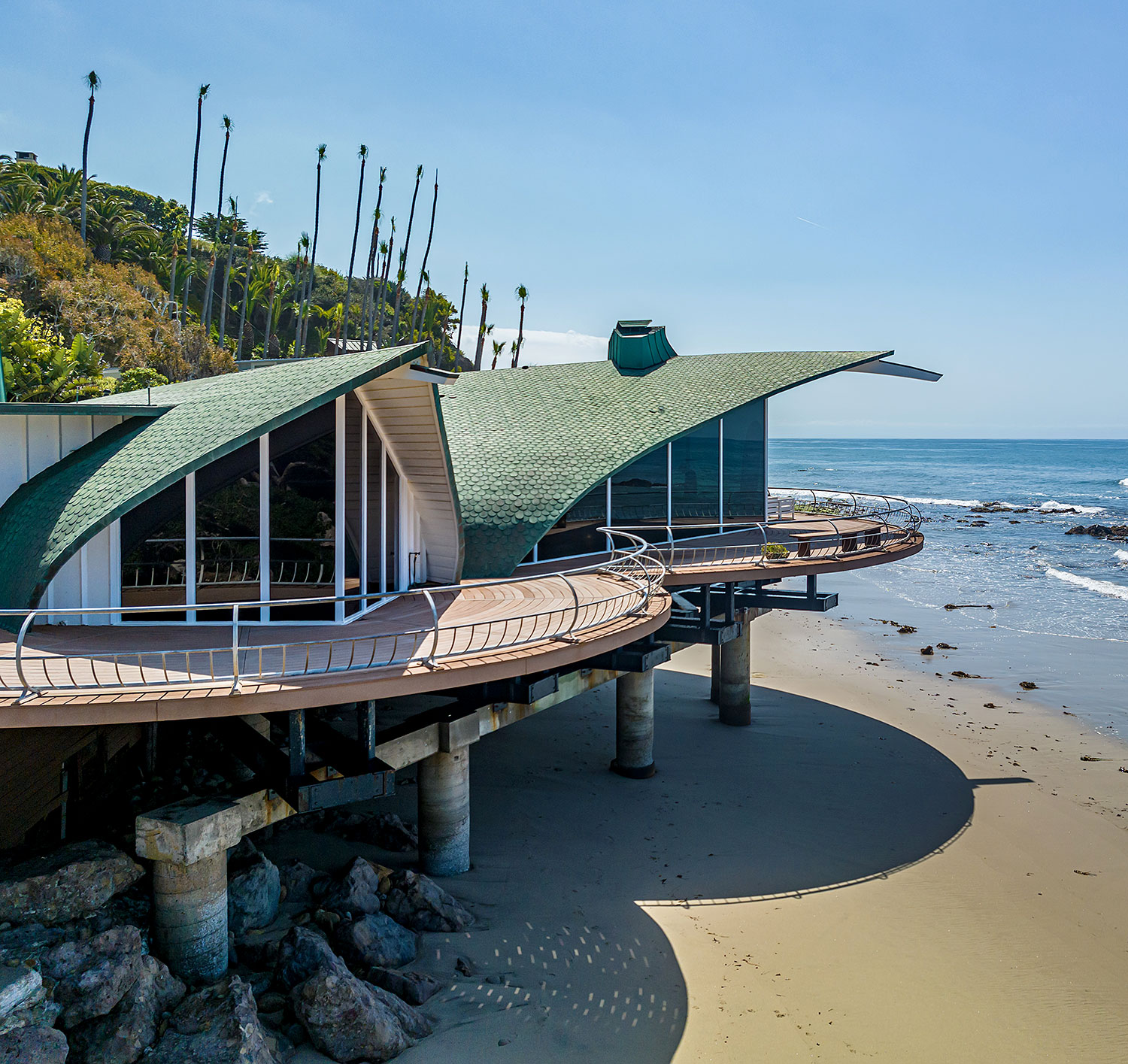 An Iconic Wave-Shaped Malibu Home, Once Owned by the Mega