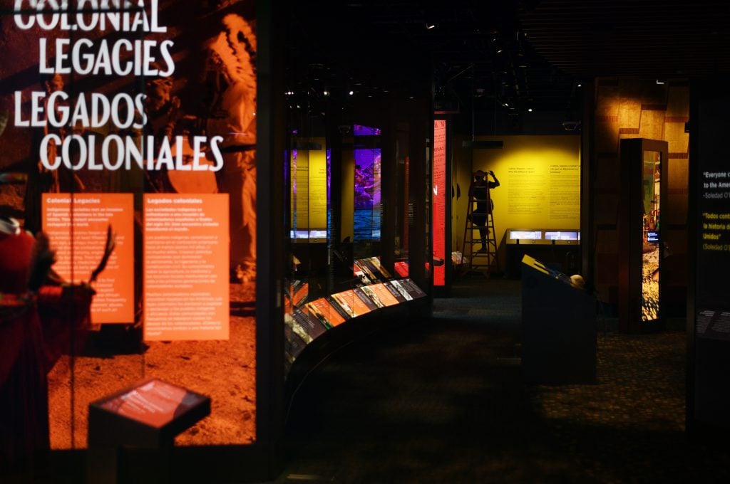 "¡Present!  A Latin American History" at the Molina Family Latino Gallery at the National Museum of American History at the Smithsonian Institution in Washington, D.C. Photo by Astrid Riecken for the <em>washington post</em> via Getty Images.” width=”1024″ height=”680″ srcset=”https://news.artnet.com/app/news-upload/2023/07/GettyImages-1241296934-1024×680.jpg 1024w, https://news.artnet.com/app/news-upload/2023/07/GettyImages-1241296934-30 0x199.jpg 300w, https://news.artnet.com/app/news-upload/2023/07/GettyImages-1241296934-1536×1020.jpg 1536w, https://news.artnet.com/app/news-upload/2023/07/GettyImages-1241296934-2048×1361. jpg 2048w https://news.artnet.com/app/news-upload/2023/07/GettyImages-1241296934-50×33.jpg 50w max-width: 1024px) 100vw, 1024px”/></p>
<p id=