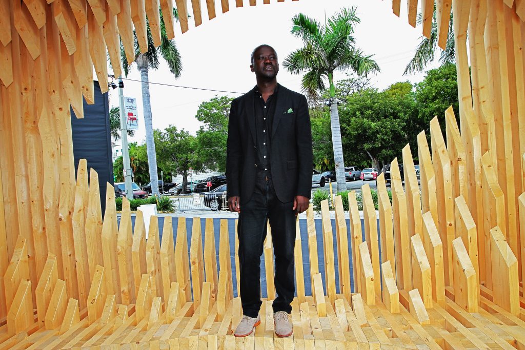 David Adjaye with Genesis at the Miami Beach Convention Center in 2011 in Miami Beach, Florida. Photo by Alexander Tamargo/Getty Images for Design Miami.