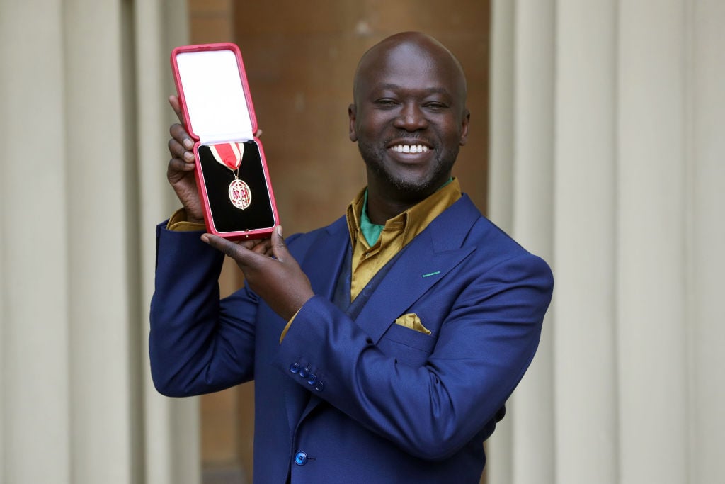 David Adjaye poses after he was Knighted by the Duke of Cambridge at Buckingham Palace on May 12, 2017 in London. Photo by Jonathan Brady - WPA Pool/Getty Images.