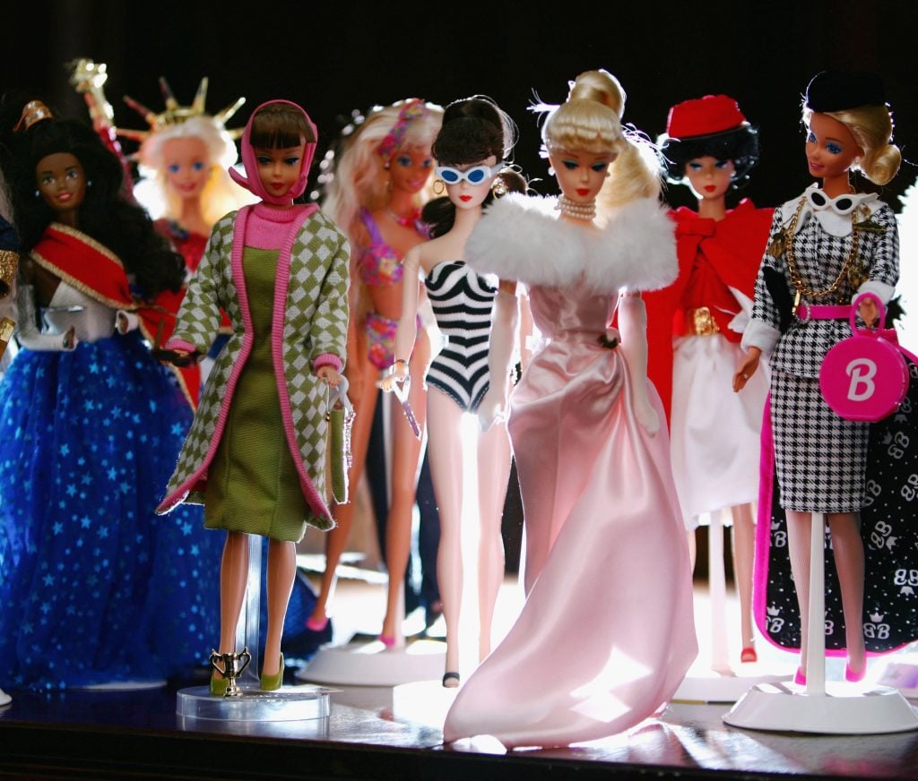 Various incarnations of Barbies, as seen in Sydney, Australia on the toy's 50th anniversary. Photo: Ian Waldie/Getty Images.