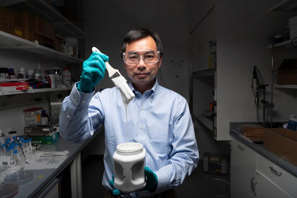 Xiulin Ruan, a Purdue University professor of mechanical engineering, with the whitest white paint. Photo by John Underwood, courtesy of Purdue University.