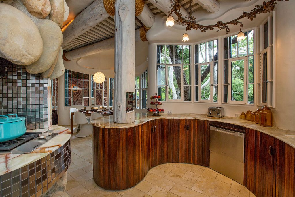The kitchen, with its unexpected contours and lack of straight lines. Photo: Scott Gibson. Courtesy of Sotheby's International Realty. 