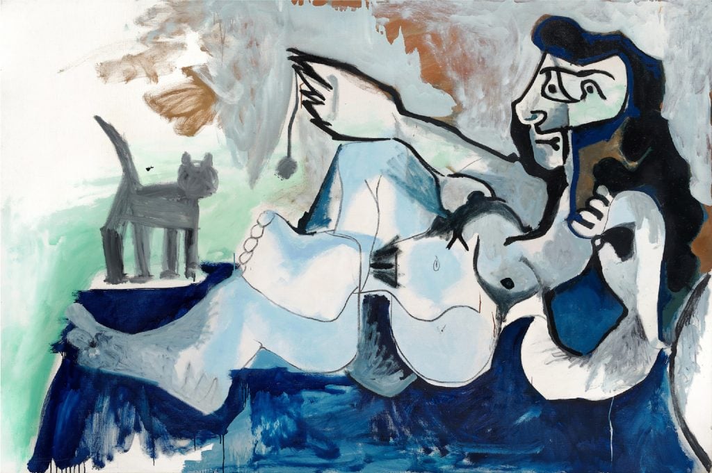 Pablo Picasso’s <i>Femme nue couchée jouant avec un chat </i>(1964) sold below the low estimate at Sotheby’s. Courtesy of Sotheby’s © 2023 Estate of Pablo Picasso/Artists Rights Society (ARS), New York.