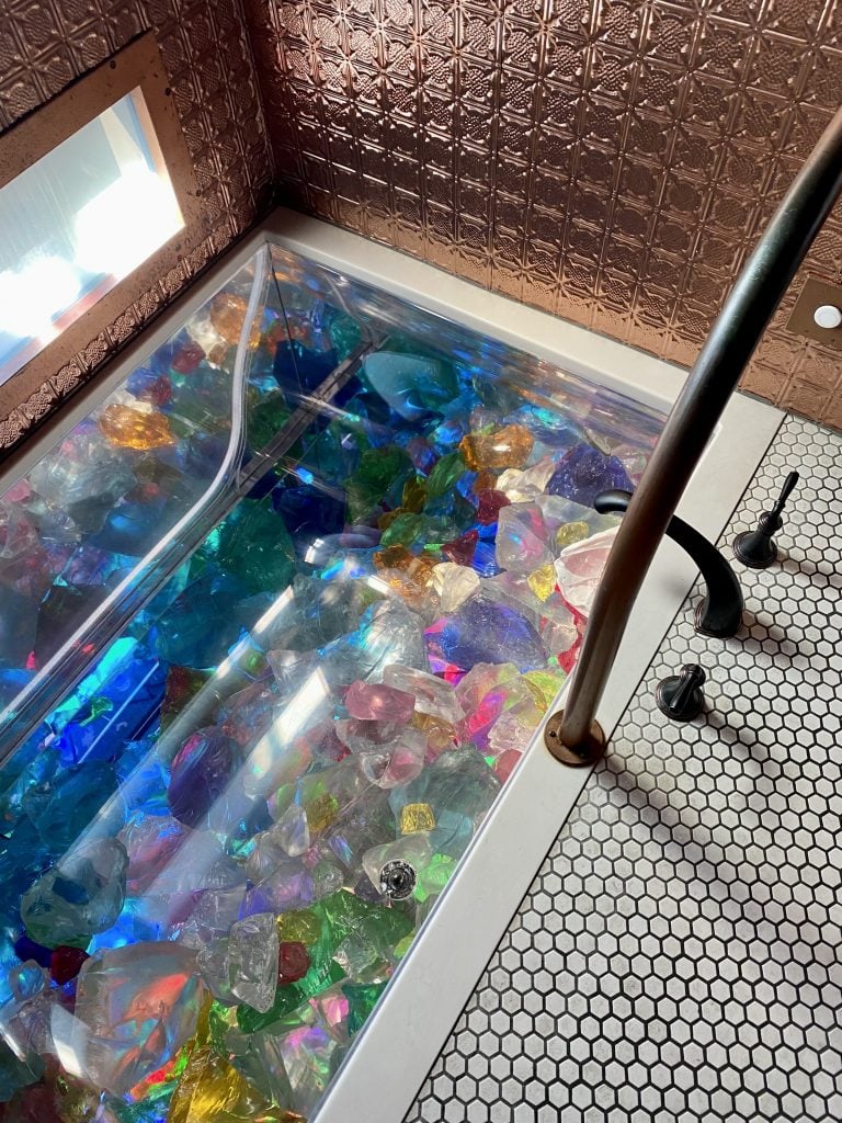 Glass sculpture in a bathtub at the Boathouse, Dale Chihuly's Seattle studio. Photo by Sarah Cascone. 