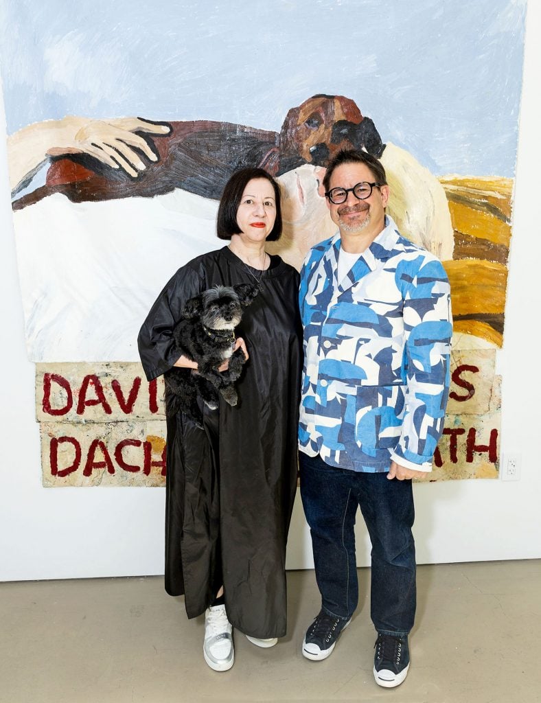 Pamela and David Hornik with a work by Sophie Barber. Courtesy of the Horniks.