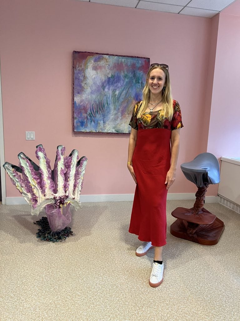 Lydia Nobles with her installation "In the Waiting Room," curated by Kapow Gallery, New York, at Spring Break Art Show New York, 2023. Photo by Matthew Cascone. 