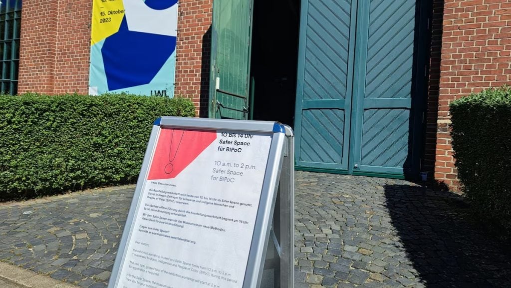 A sign explaining suggested BIPOC-only visiting hours for “This Is Colonialism” exhibition at the LWL Museum Zeche Zollern in Dortmund, Germany. Photo courtesy of the LWL Museum Zeche Zollern, Dortmund, Germany.