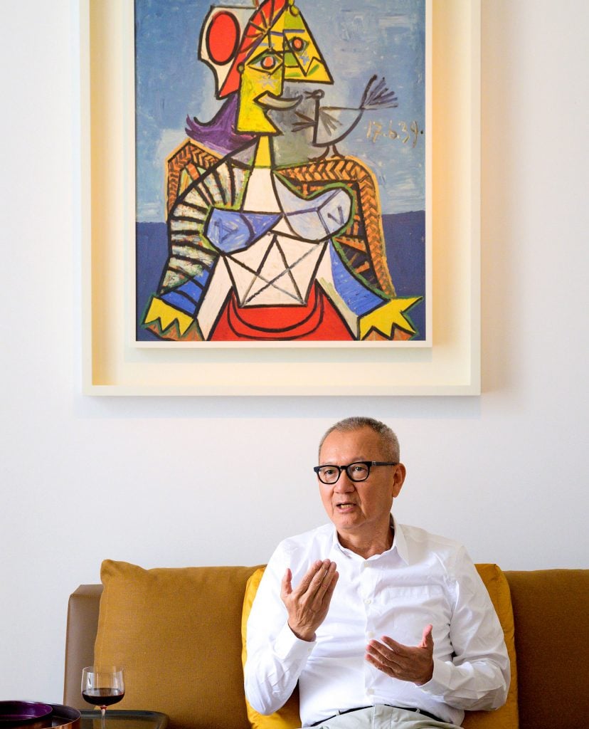 Pierre Chen with a work by Pablo Picasso. Courtesy of Sotheby's.