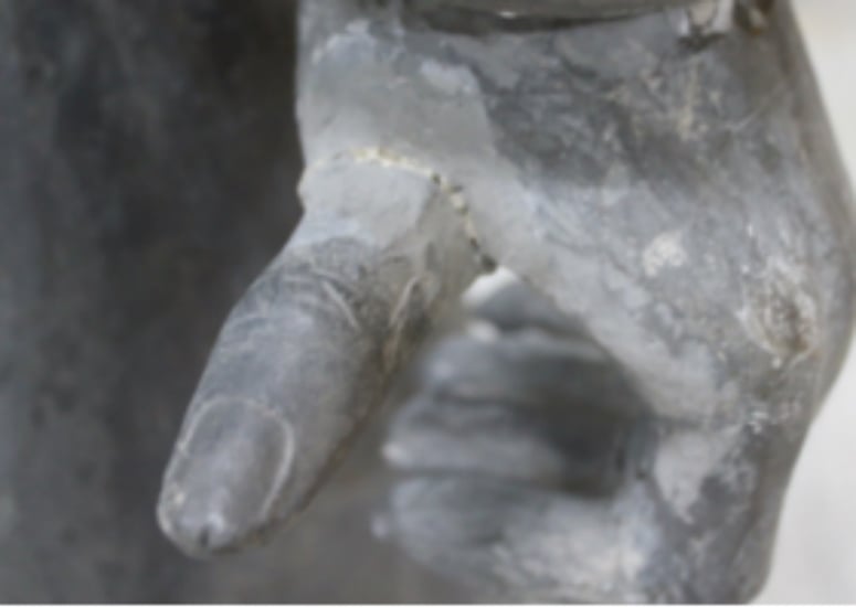 The broken thumb on <em>The Cavalryman</em>, the Terracotta Warrior statue vandalized by Michael Rohana at an ugly sweater party at Philadelphia's Franklin Institute. Photo courtesy of federal prosecutors. 