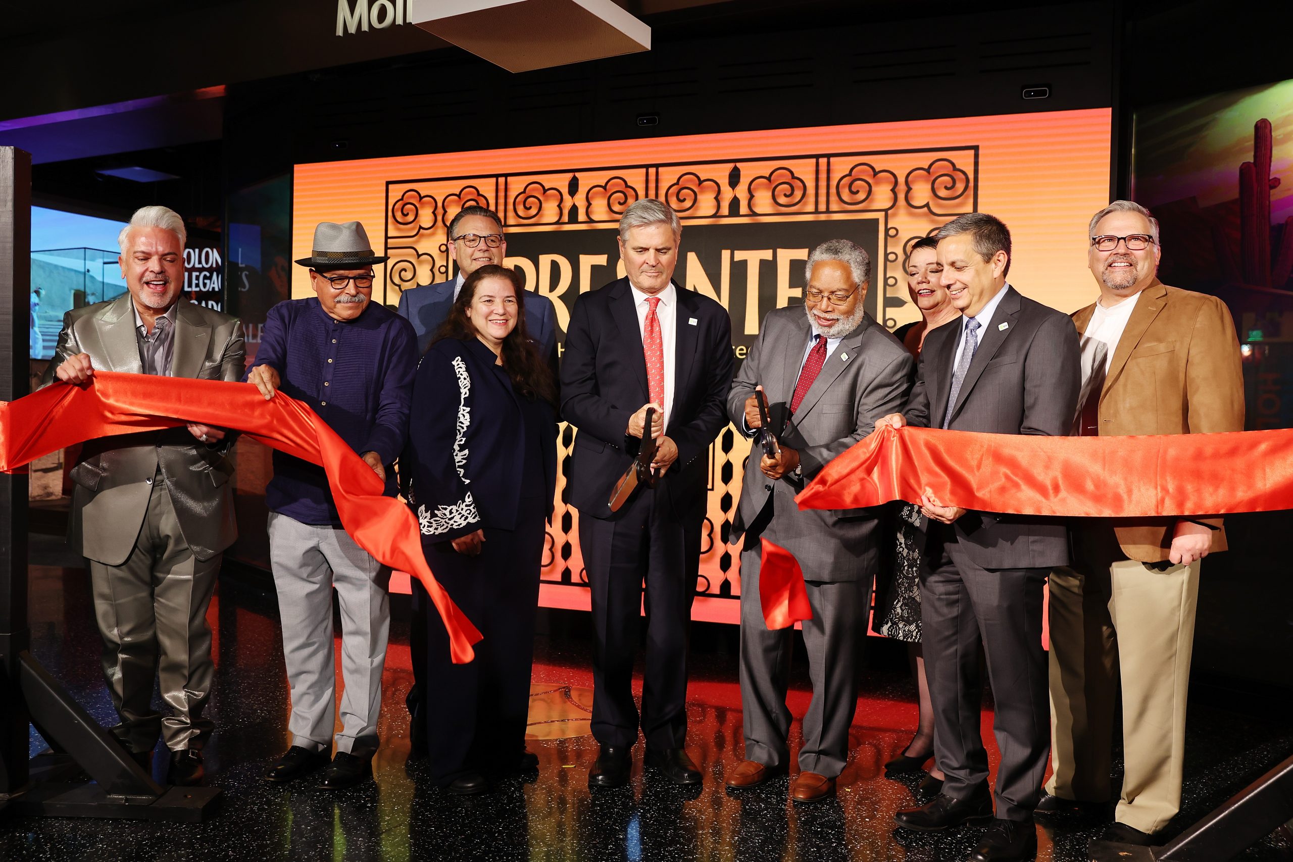 Henry R. Muñoz III, Eduardo Díaz, J. Mario Molina, Martha Molina Bernadett, Steve Case, Lonnie Bunch III, Josephine Molina, Jorge Zamanillo, and John C. Molina cut the opening ribbon during the Smithsonian Latino Museum reception on June 16, 2022 in Washington, D.C. Photo by Tasos Katopodis/Getty Images for Smithsonian Latino Museum.