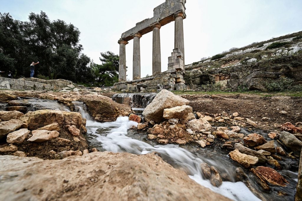 Water flows through the ruins at the site of the Greco-Roman city of Cyrene.