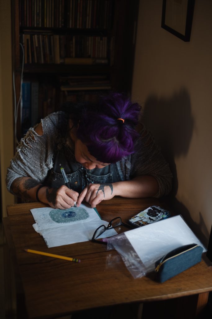 Artist Jasmin Sian working in her home studio. Photo by Mike Vitelli, courtesy of Anthony Meier, Mill Valley, California.