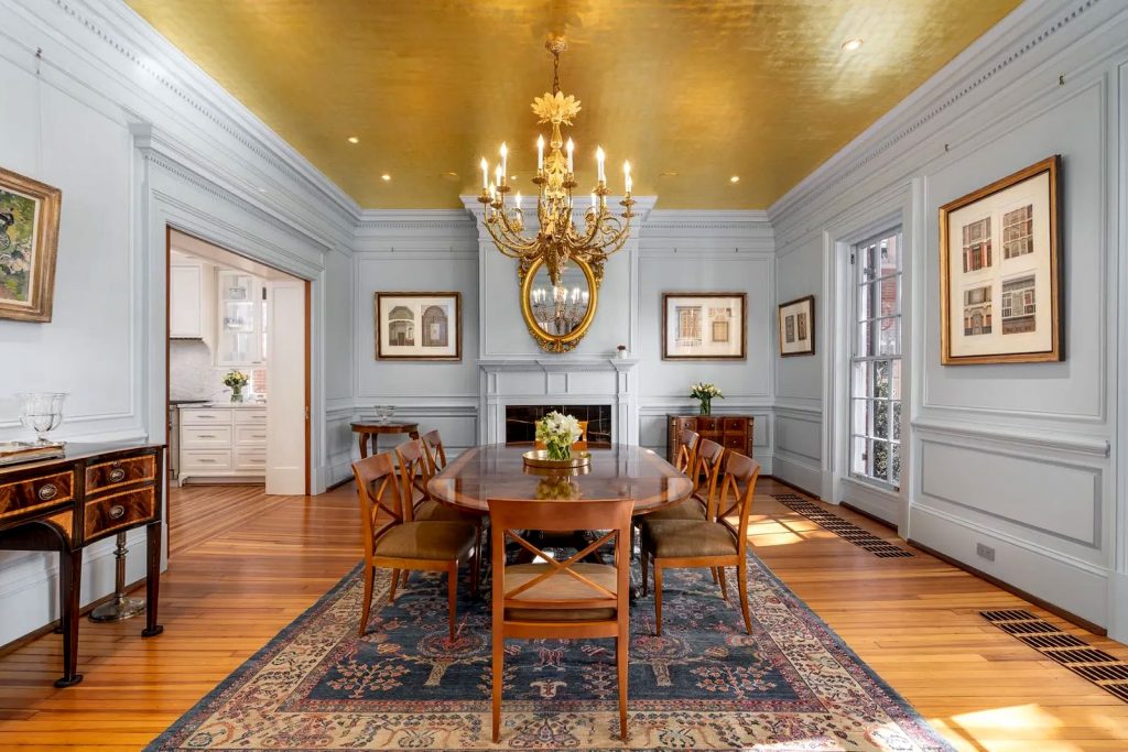 The dining room features a gold-leaf ceiling. Photo: Sean Shanahan. Courtesy of Sotheby's International Realty.