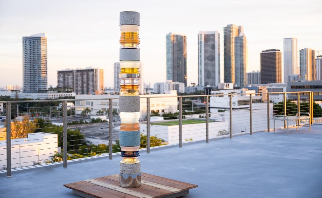 Matt Gagnon's Sometimes in the sky (2023), aptly displayed at Gaggenau's new flagship before the Miami skyline. Courtesy of Gaggenau.