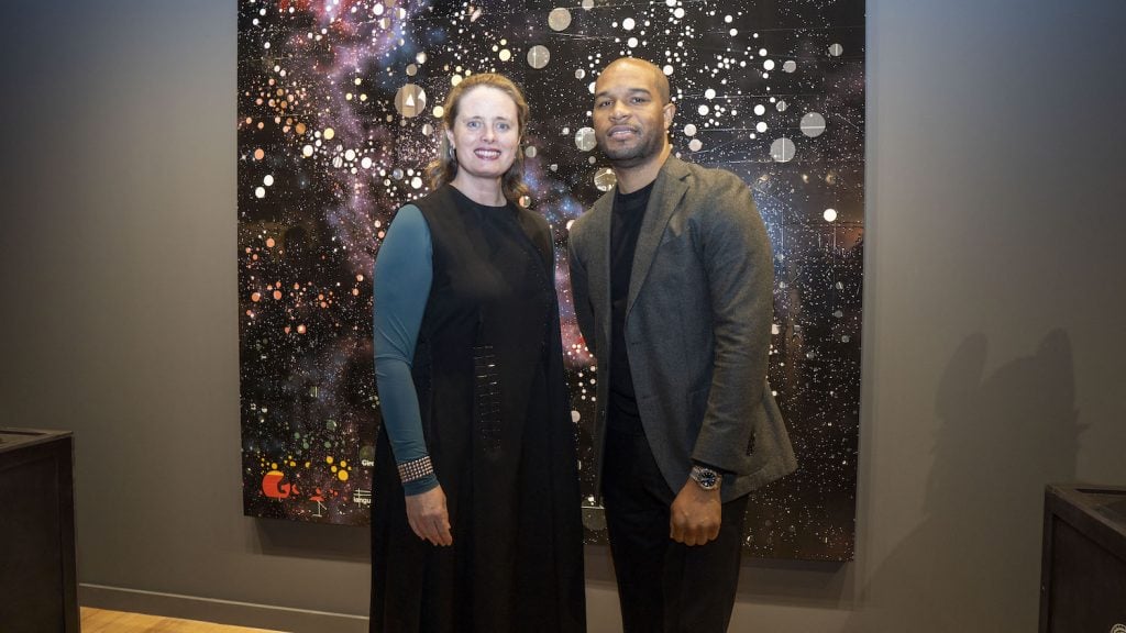 Installation view of Tavares Strachan, <i>The Universe with red, yellow and green</i> at ADAA Art Fair with Emily-Jane Kirwan. Courtesy of Jayden Bempong.