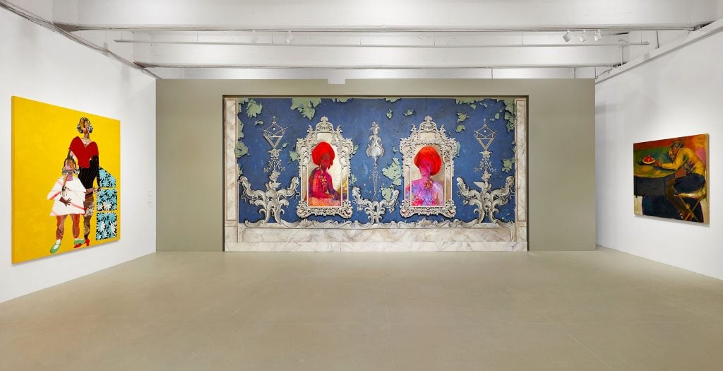 Installation view of "Making Their Mark." Left to right: Tschabalala Self,<em>Sisters</em> (2021), Firelei Báez,<em>For Améthyste and Athénaïre (Exiled Muses Beyond Jean Luc Nancy’s Canon), Anacaonas</em> (2018), Lynette Yiadom-Boakye,<em>Afterword</em> (2019). Courtesy of Komal Shah.