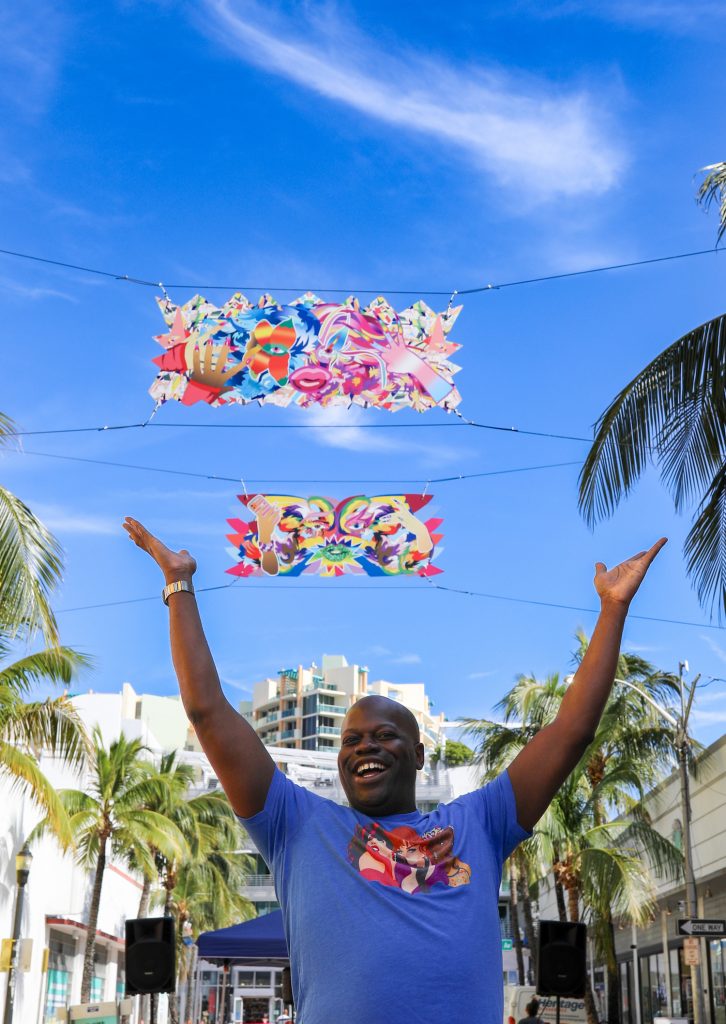 Drag performer Tiffany Fantasia at the unveiling of <i>Adora Vaness Athena Fantasia</i> (2023) by Assume Vivid Astro Focus in Miami Beach. Image courtesy of the City of Miami Beach.