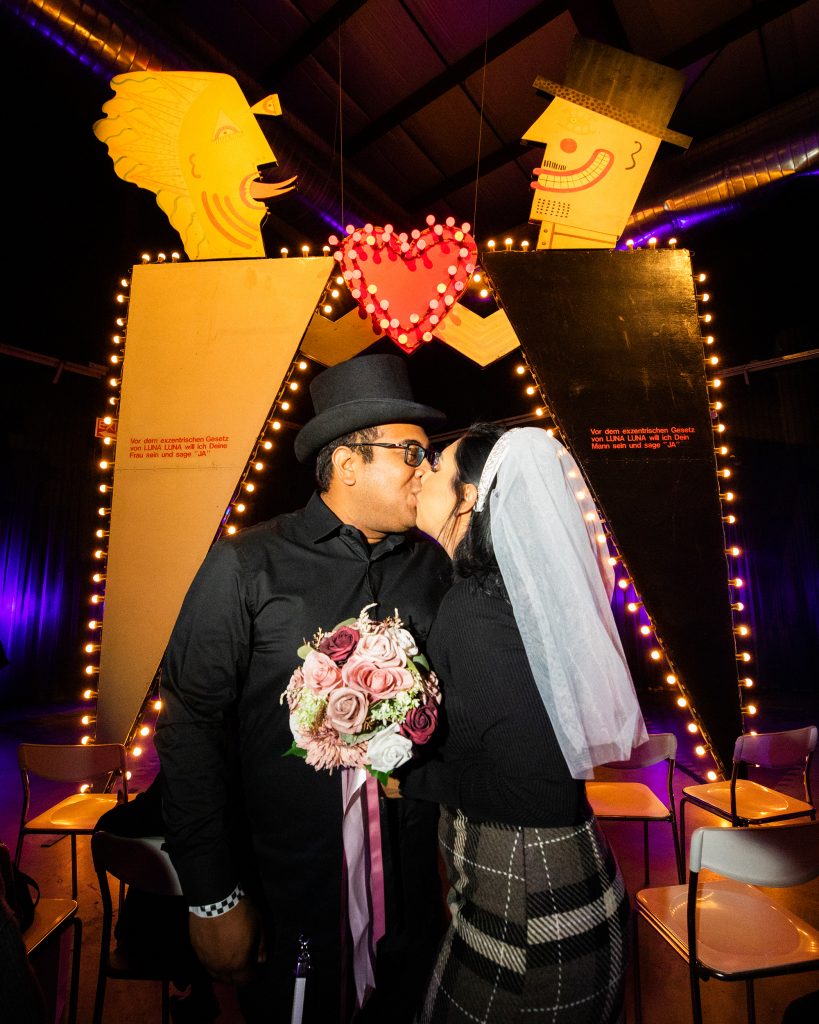 A couple being "wed" at André Heller's Wedding Chapel at "Luna Luna: Forgotten Fantasy." Photo: Sinna Nasseri.