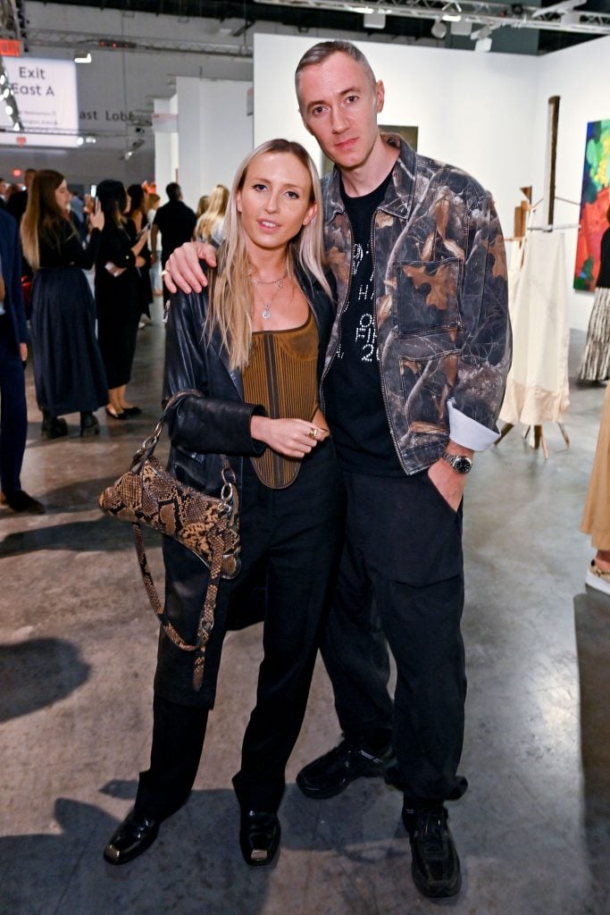 British actress Angelica Mandy and DJ Benji B attend the VIP preview of Art Basel Miami Beach at the Miami Beach Convention Center on December 6, 2023 in Miami Beach, Florida.