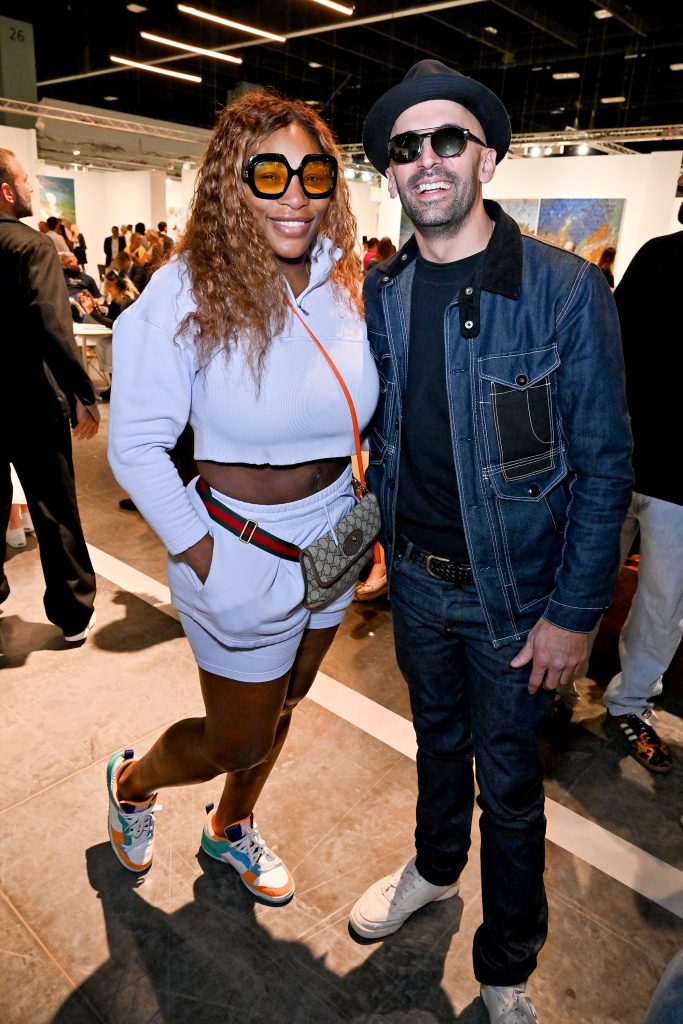 Serena Williams and artist JR attend the VIP preview of Art Basel Miami Beach at the Miami Beach Convention Center on December 6, 2023 in Miami Beach, Florida.
