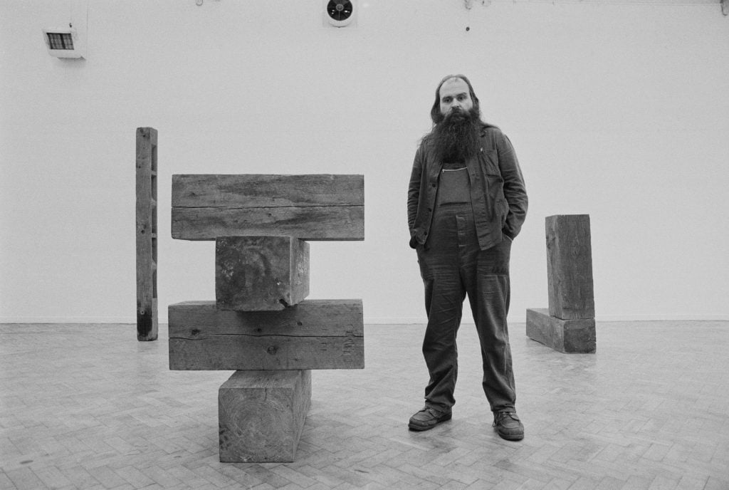 Carl Andre at the Whitechapel Gallery in London, 1978. Photo: Evening Standard/Hulton Archive/Getty Images.