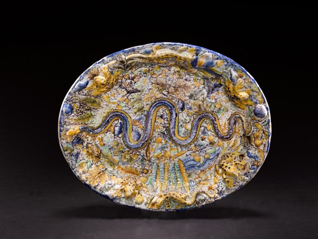 Palissy, an English delftware large oval dish with a large snake, (circa 1635-50) “Southwark, probably Pickleherring Quay” sold at Sotheby’s London on July 5, 2022 for $75,000 (£63,000). Image courtesy Sotheby's.