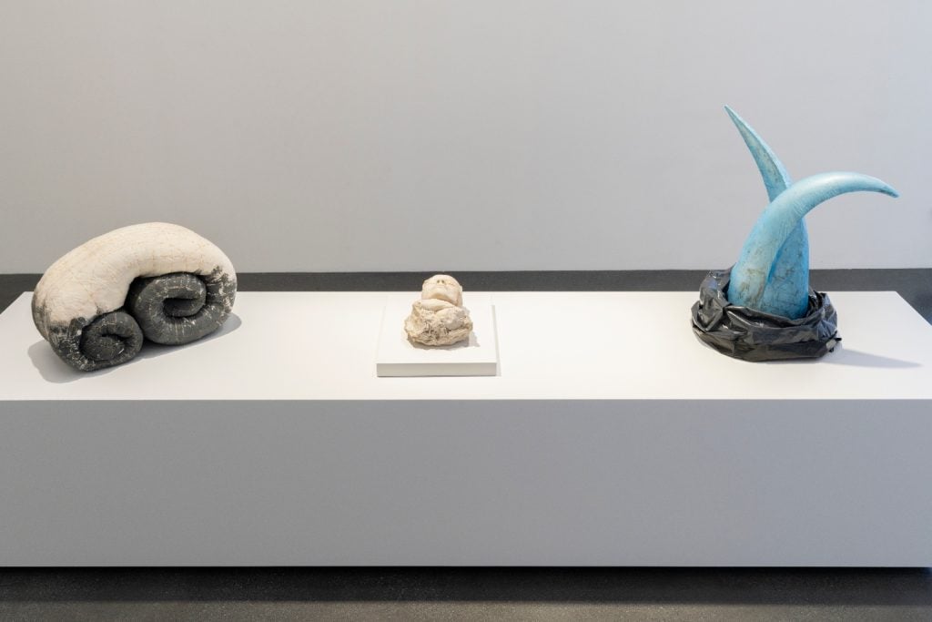 Anu Põder's <i>Rolled-up Figure</i> and <i>Spring '92</i> (both 1992) in "Anu Põder: Space for My Body" at the Muzeum Susch. Photo: Federico Sette, courtesy of Muzeum Susch Art Stations Foundation.