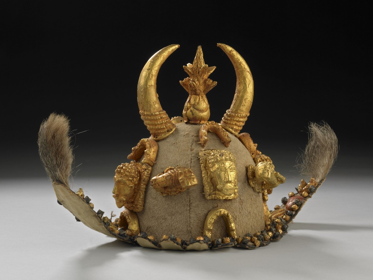 Ceremonial gold cap as part of denkyemkye.