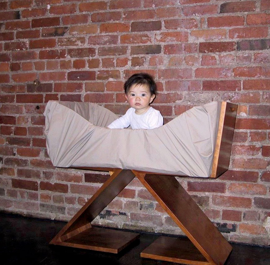Rietveld Zig Zag chair (1930), reconfigured as a baby bassinet. 