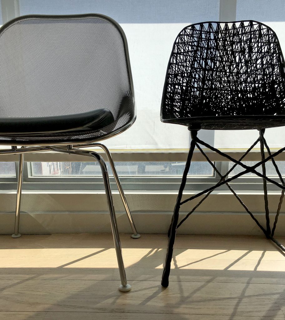 Antonio Citterio's Luta chair (2000), left, Marcel Wanders and Bertjan Pot's Carbon chair (2004). 