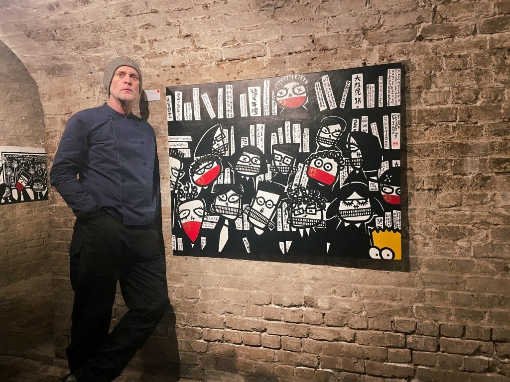 Artist Martin Lever at his London solo exhibition 'Silent Protest'