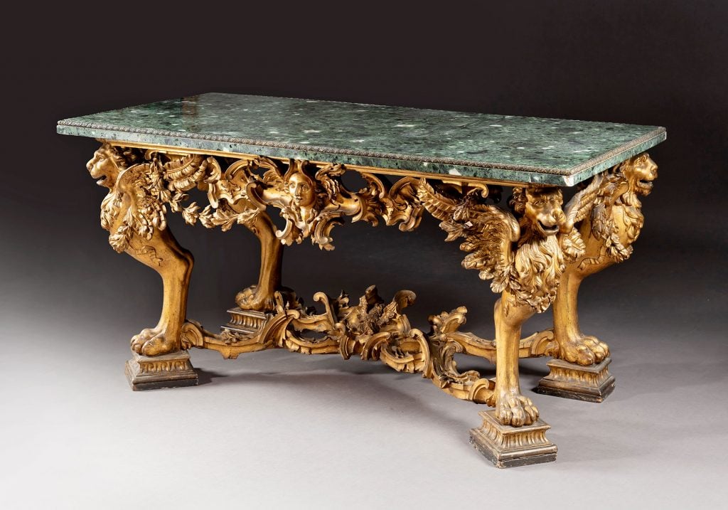 An Italian carved giltwood console table, Rome, mid-18th century