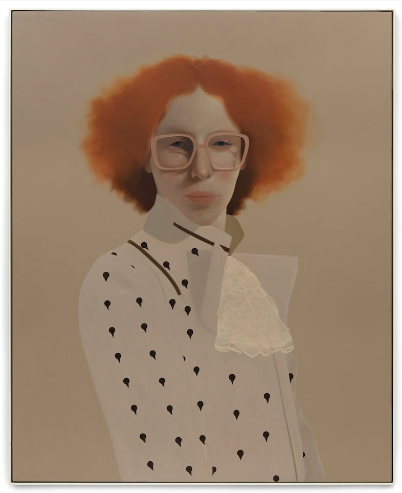 A painted portrait of a person with red curly hair, glasses, and a polka dot shirt by artist Sarah Ball.