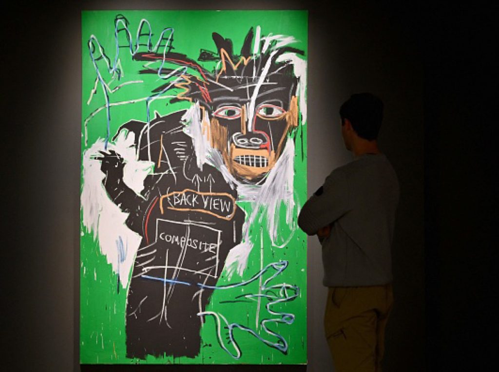 Jean-Michel Basquiat’s <em>Self-Portrait as a Heel (Part Two)</em> (1982) sold to its third-party backer at Sotheby’s in November for $42 million. Photo by Angela Weiss/AFP via Getty Image.
