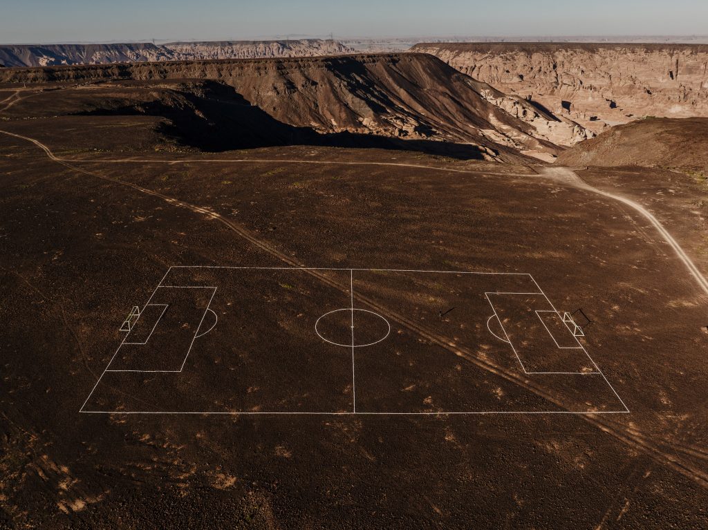 A rock garden in the shape of a full-sized soccer field