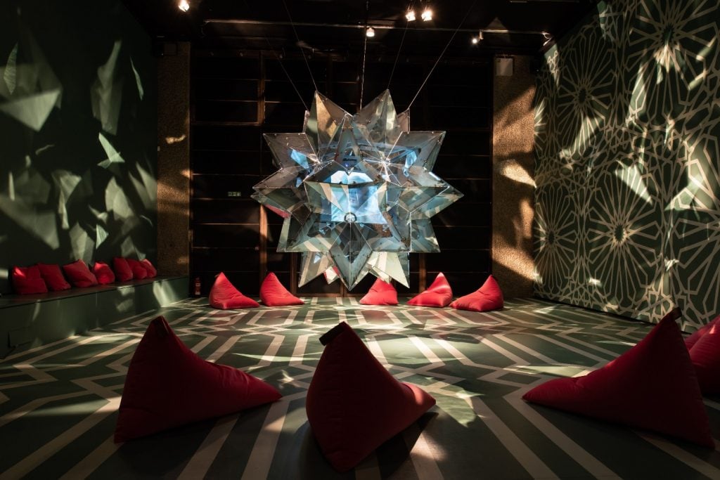 A star shapped mirrored installation in the Soheila Sokhanvari exhibition at the Barbican.