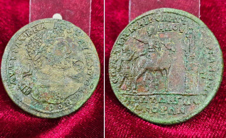 Two side of an ancient coin on a red background. The medallion depicts Emperor Caracalla and was minted in Asia Minor