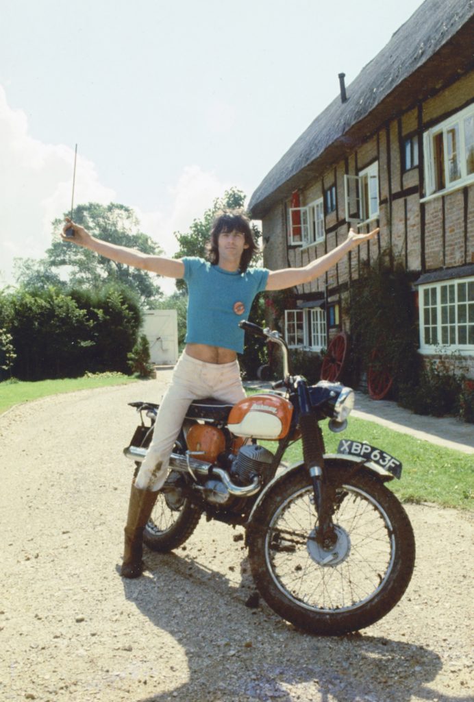 Tony Sanchez, <I>Keith Richards and his motorbike, Redlands, (early 1970s)</I>. Courtesy of Spanish Tony Media and Bayliss Rare Books.