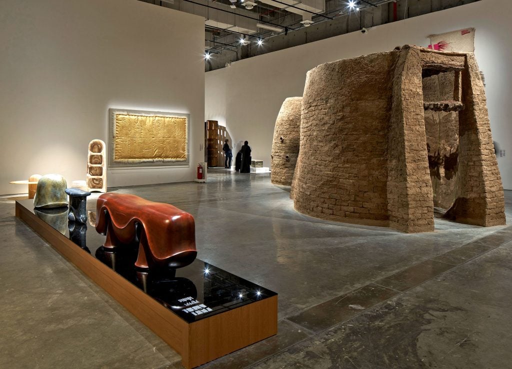 Installation view of "Arab Design Now" with Salima Naji's clay dwellings on the right.