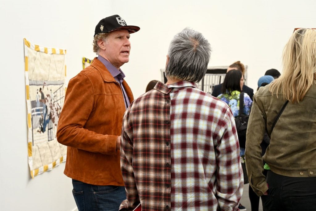 Will Ferrell chats with another art-lover. Photo by Casey Kelbaugh. 