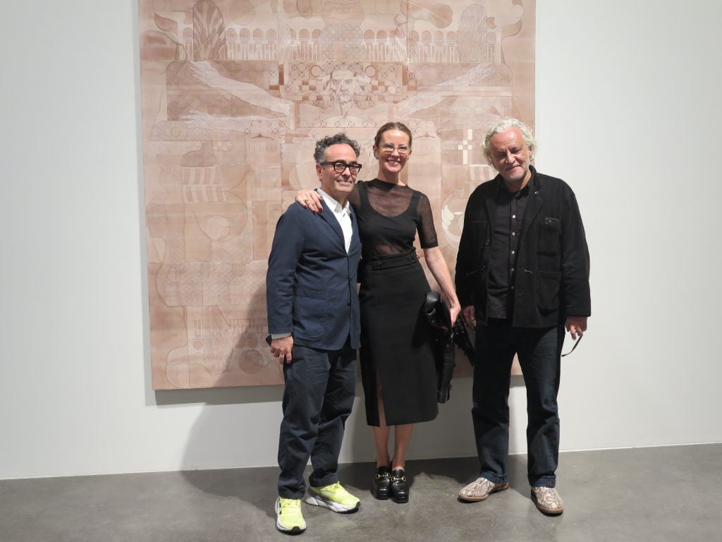 photograph of jose kuri, monica manzutto and gabriel orozco infront of a painting