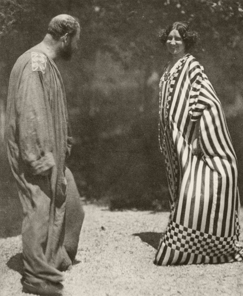 photograph of gustav klimt anf emilie floge wearing robes in the sun 