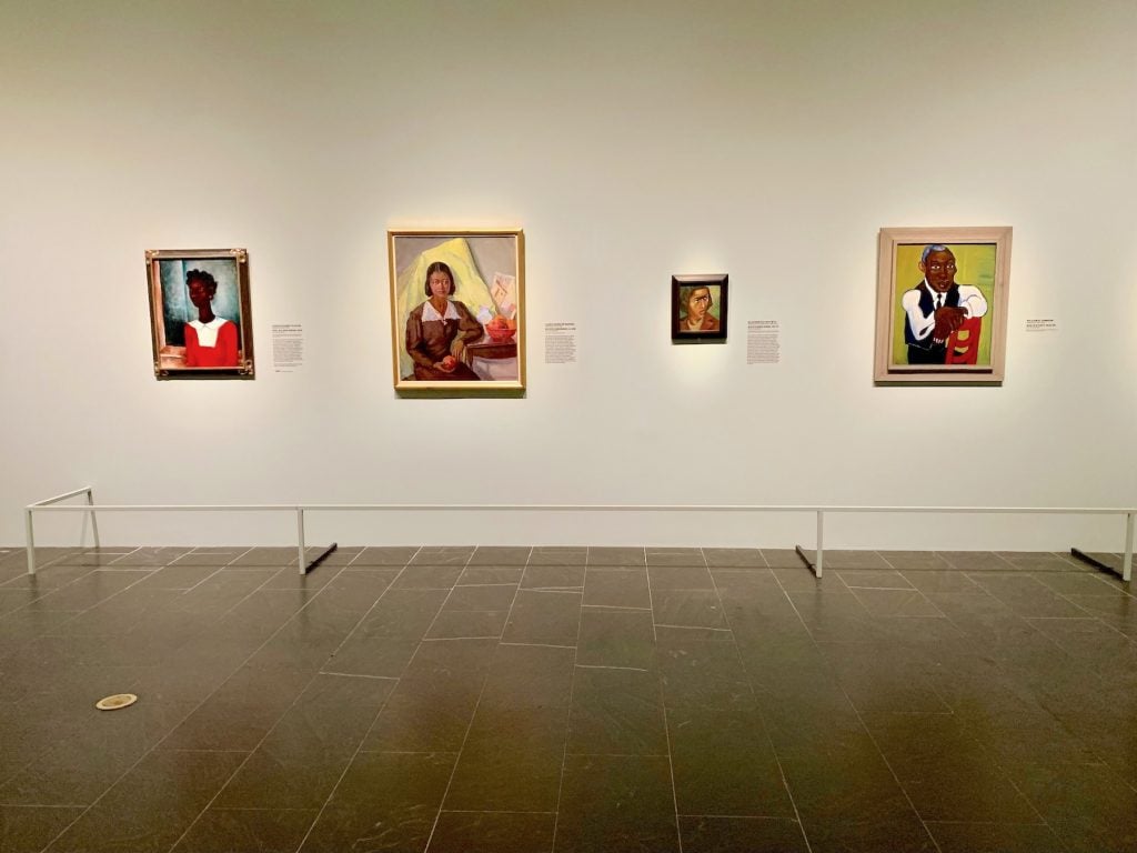 Four paintings in the "Portraiture and the Modern Black Subject" gallery of "The Harlem Renaissance and Transatlantic Modernism" at the Metropolitan Museum of Art
